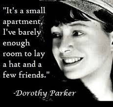 Meme of a young woman, smiling and wearing a hat, with the Dorothy Parker quote, "It's a small apartment, I've barely enough room to lay a hat and a few friends."